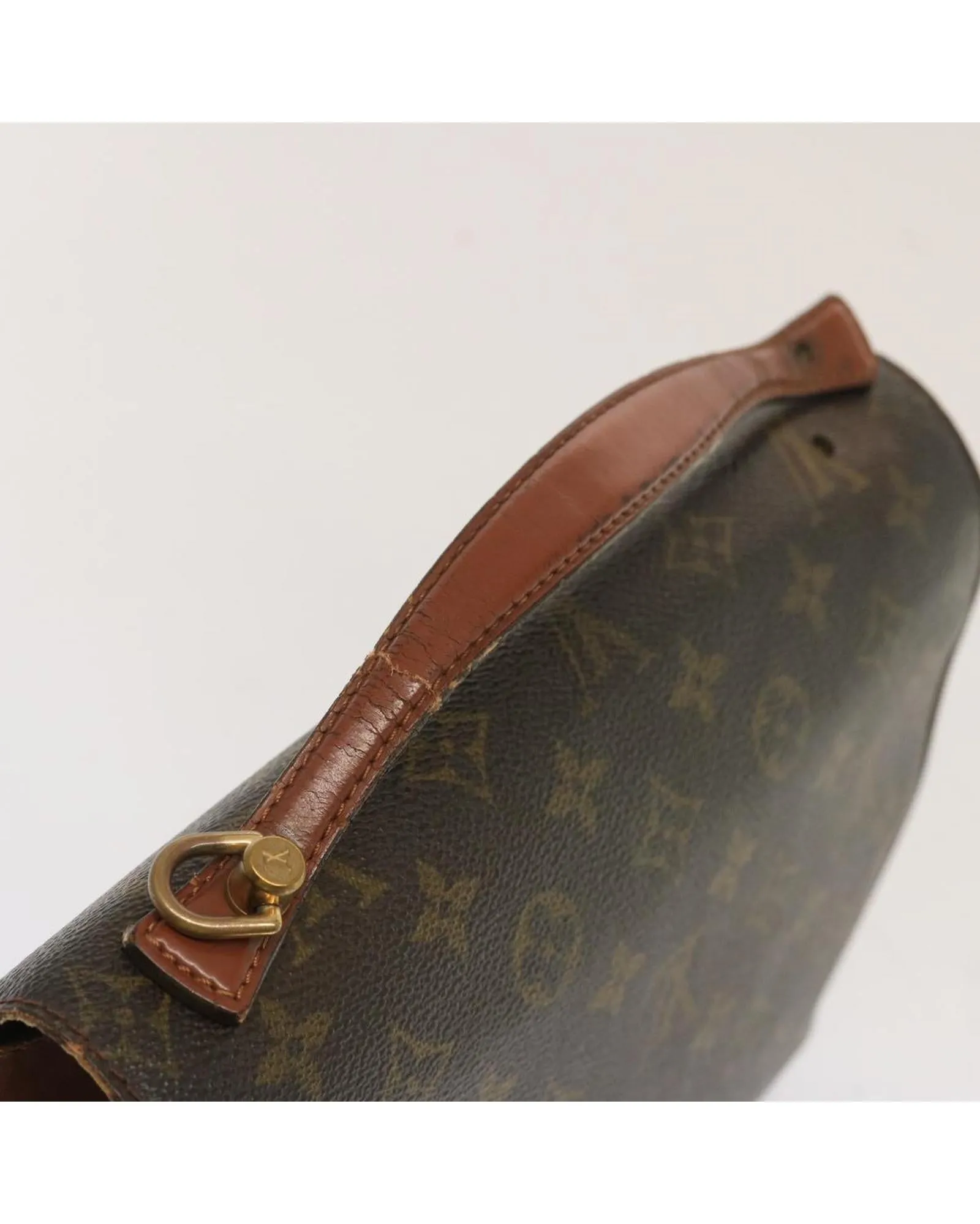 Monogram Shoulder Bag with Key Accessory and Distinctive Shape